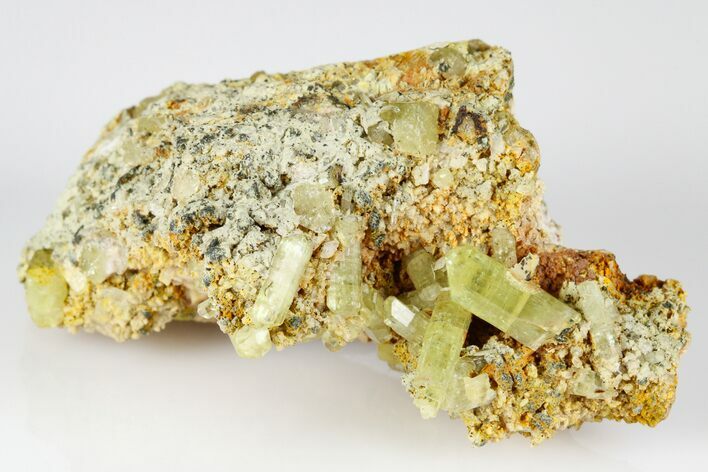 Lustrous, Yellow Apatite Crystals on Feldspar - Morocco #185455